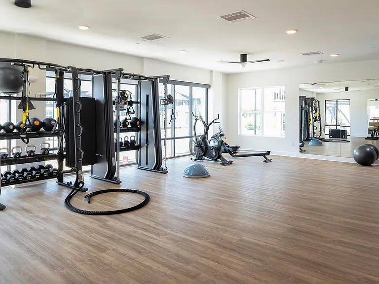 Two-level fitness center with cardio and strength equipment
