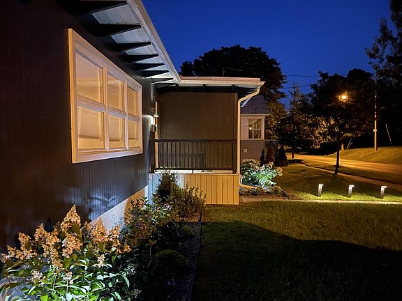 Solar lights accent the outside features of the house.
