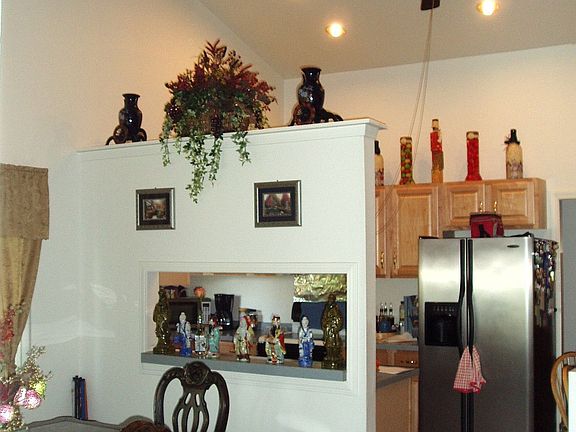 Spacious Kitchen w/Eating Area. Butler pass through into D/R.  