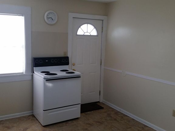 Eat in kitchen. Door is entrance to house from side covered porch.