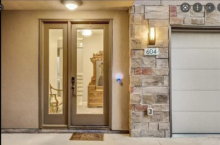 Front Entrance with Video Door Bell and smart home lights.