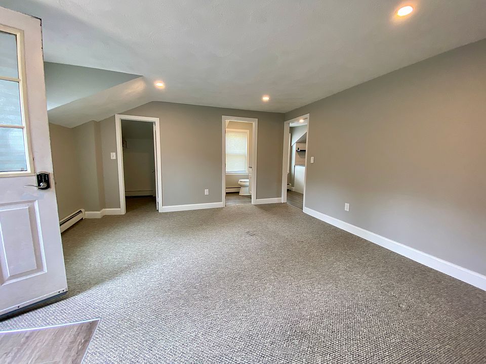 Living room - open door is the main entry into the unit.