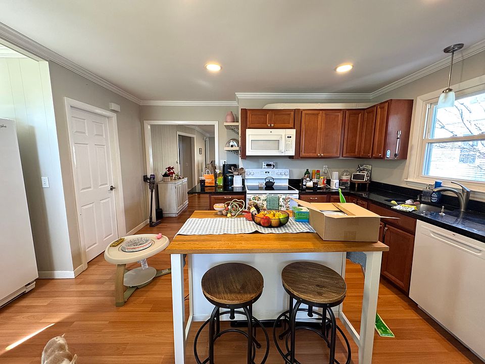 View of kitchen leading into the living room.