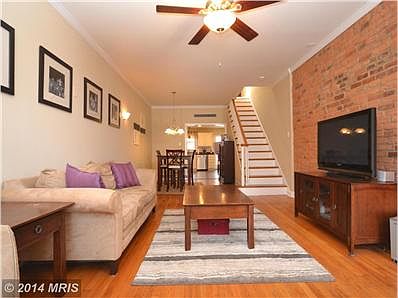 Living Room w/ exposed brick
