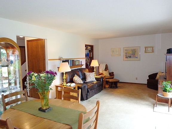 Living room open to the dining room.