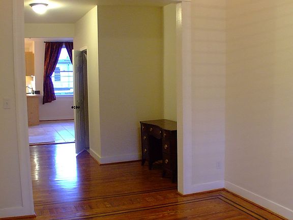 Looking from the living room into the office nook through to the dining room