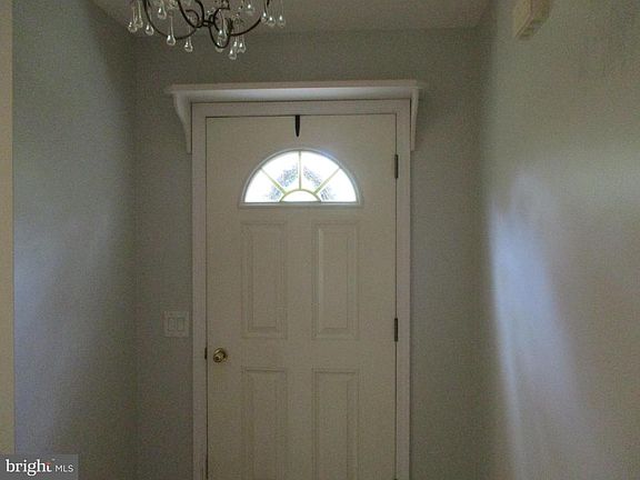 Foyer is 12x4 with a Lovely Chandelier