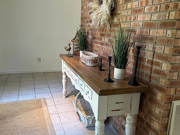 Inviting natural brick entryway