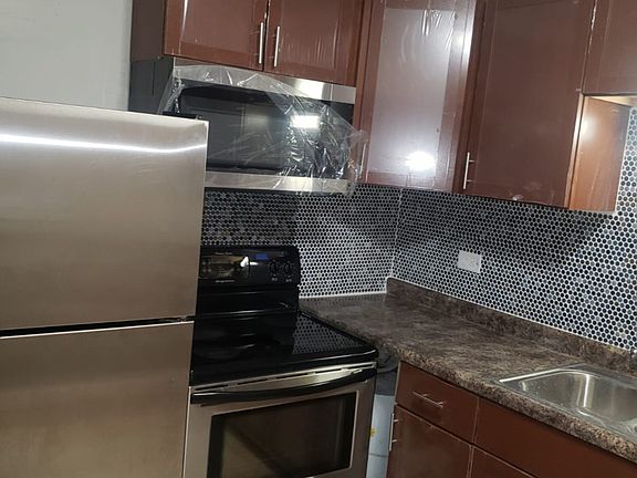 2nd image of 1900 N Green Ln N #2B