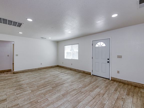 Large Living Room, All Tile Floors, Central Heating and Air Conditioning, Updated Fixtures.