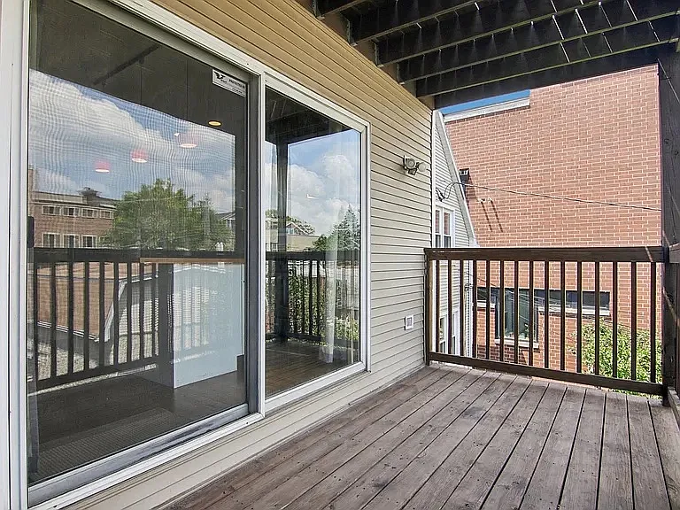First floor balcony off of the kitchen