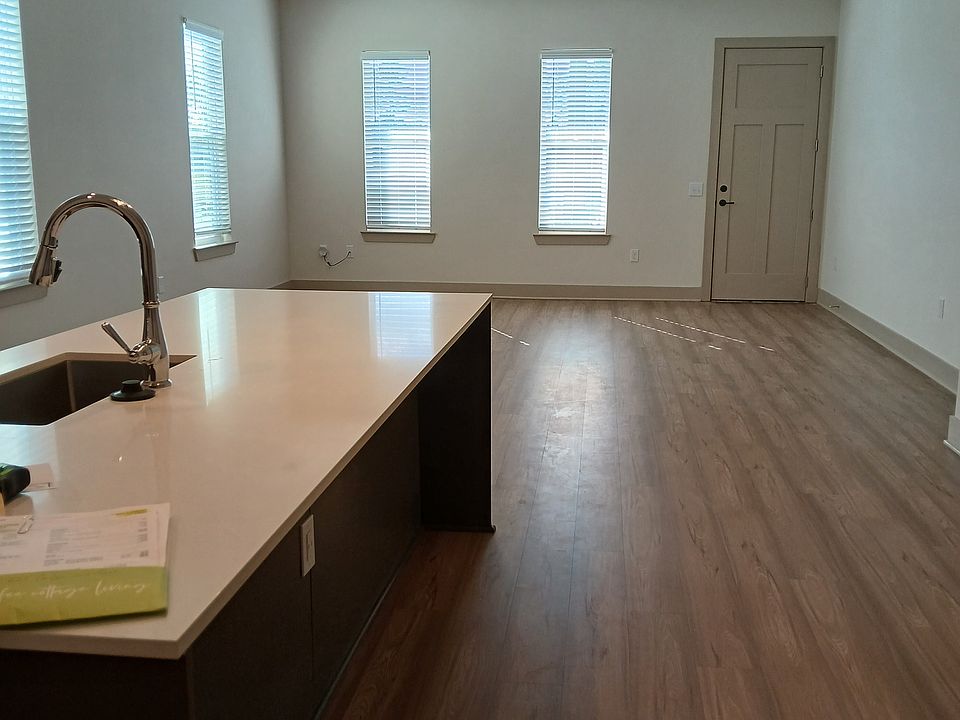 Open concept 1291 sq ft LVP flooring all except both bedrooms carpeting.
