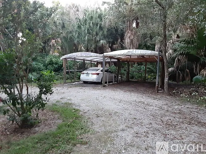 Carport to keep your vehicle out of the sun.