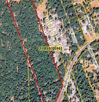 Aerial Photo.  22.7 acres with home.  Zoned for 2.3 acre lots.