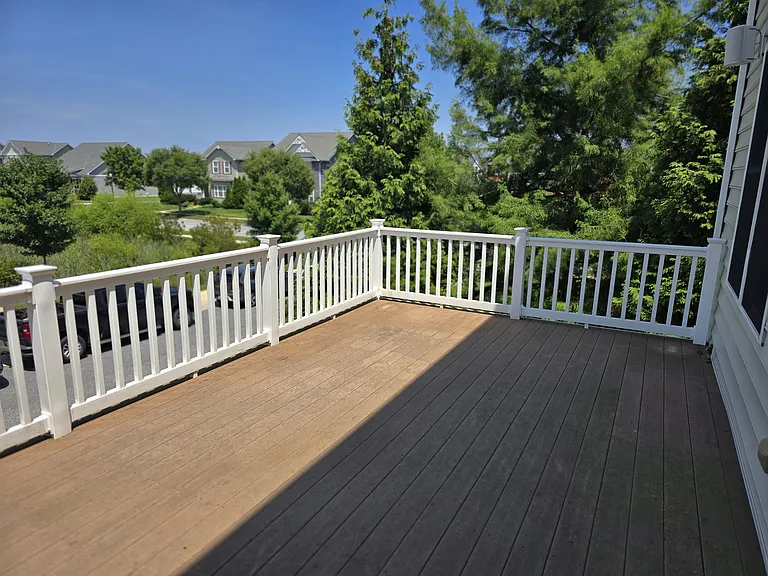 Spacious second floor deck with ability to tie into propane for grill.