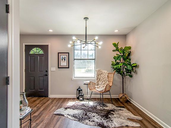 Small living room is just off of the kitchen.