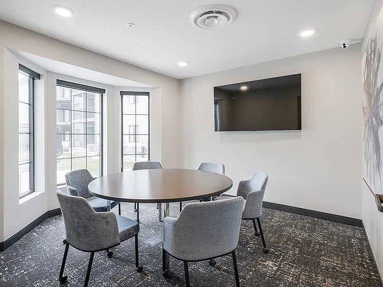 Need a quiet workspace? Our conference room is a great option.