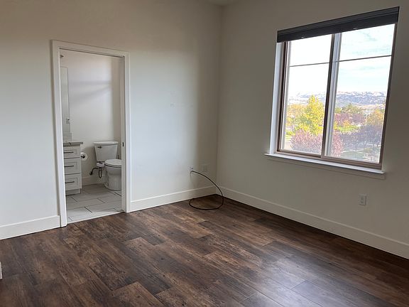 Primary with views of east foothills and en suite bathroom