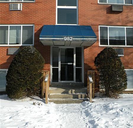 One of the buildings at Plaza Garden Apartments.