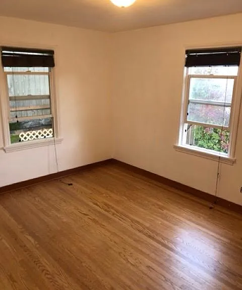 2nd Bedroom - windows facing north and east