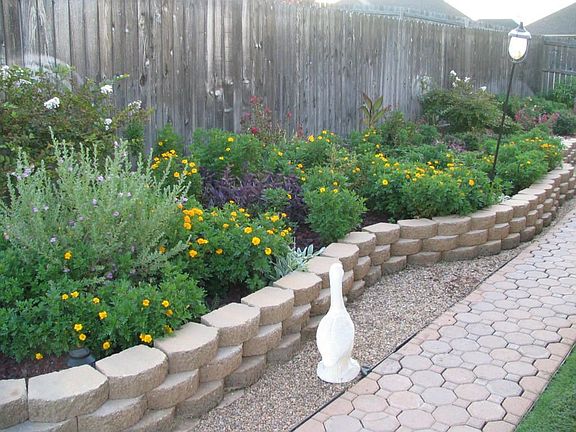 retaining wall and flower garden
