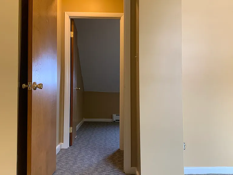 View across landing to 2nd bedroom