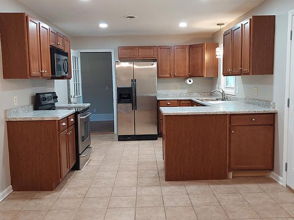 Open concept kitchen with new countertops.