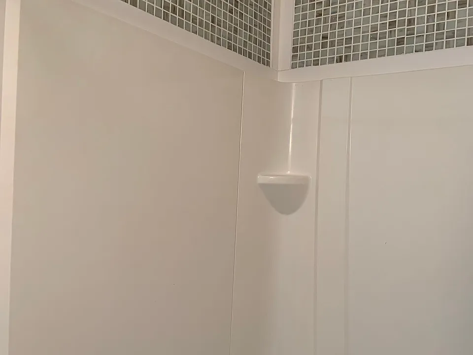 First Floor Laundry Room with Shower, Toilet and Laundry Tub.