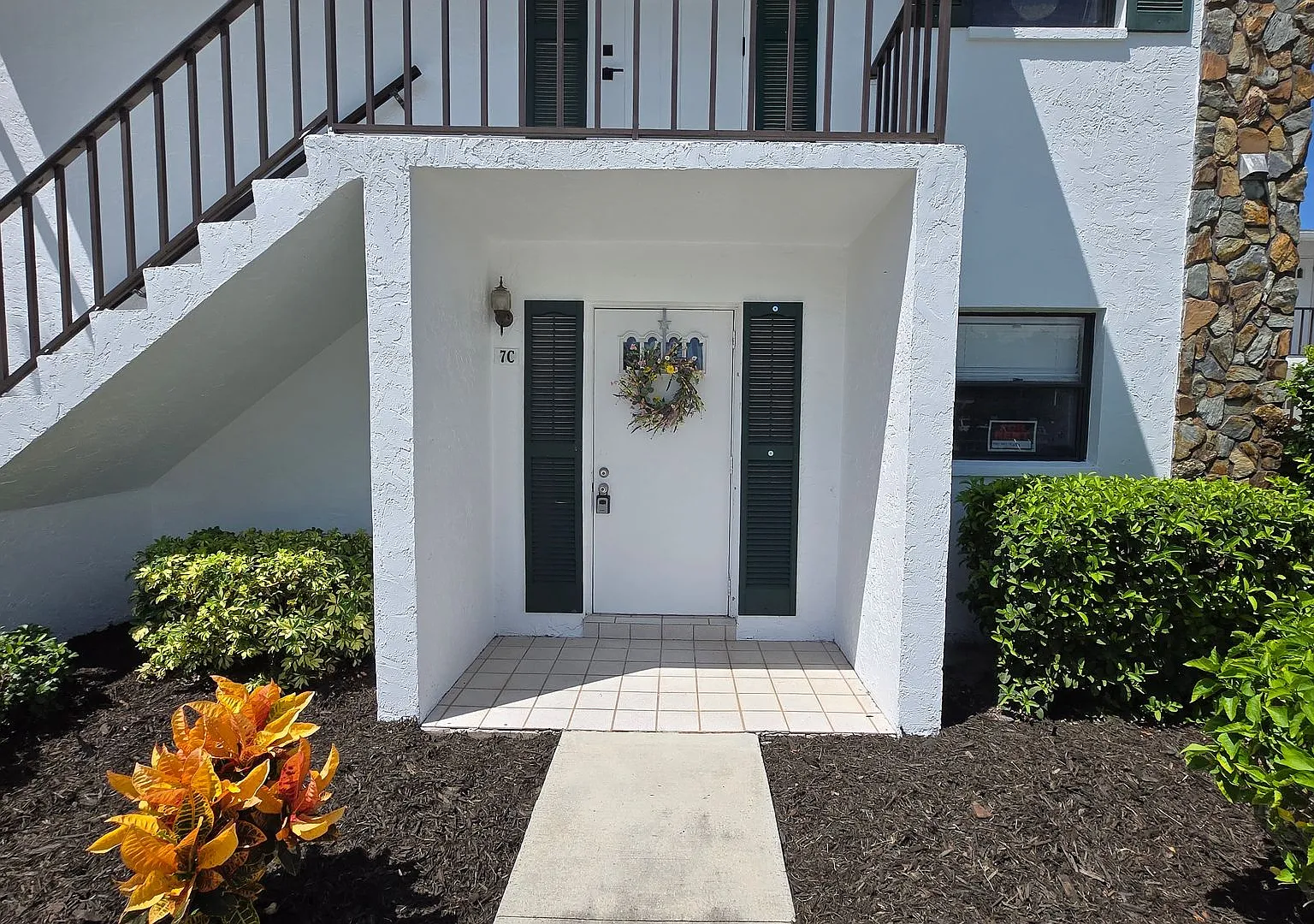 You Will LOVE this Ground Floor 2 Bedroom - Water Included (55+ Community) — Photo 1