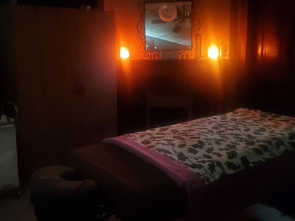 Bedroom with fireplace. Massage table not included