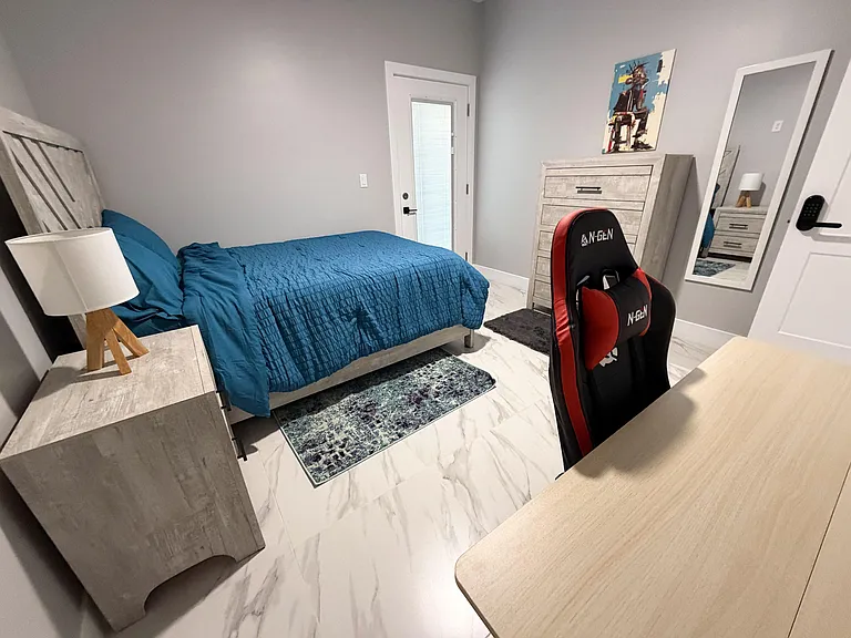 Full bed, nightstand, dresser, quick and easy access to relaxing in the backyard with its private entrance