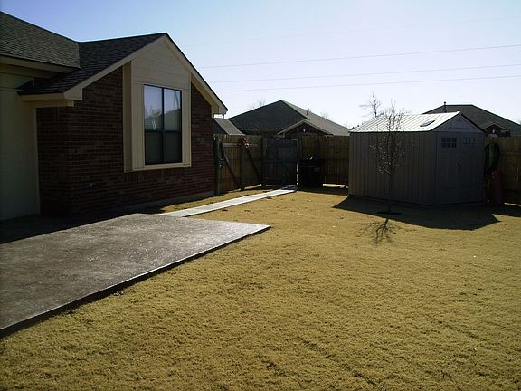 New patio, shed, & fence