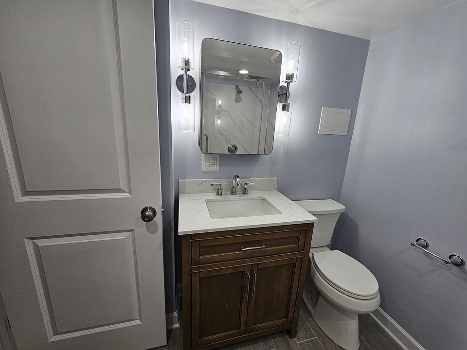 view of the vanity and mirror