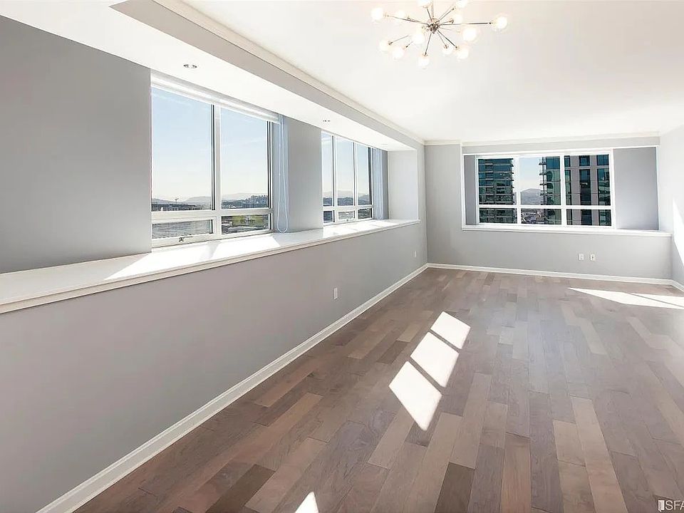 Living room with views of ocean and SF Giant's Oracle Park