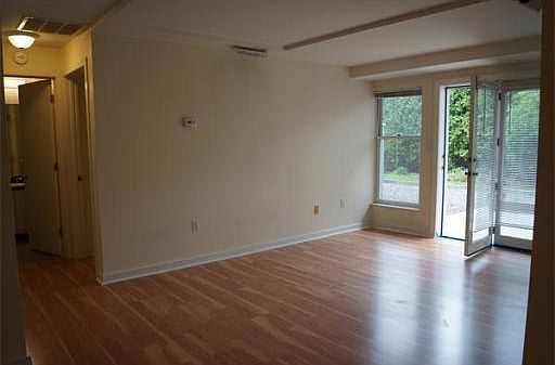 Living room with access to private, quiet patio