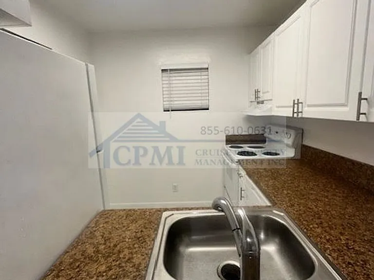 Colonial Village - 7550 Stirling Rd — Photo 36