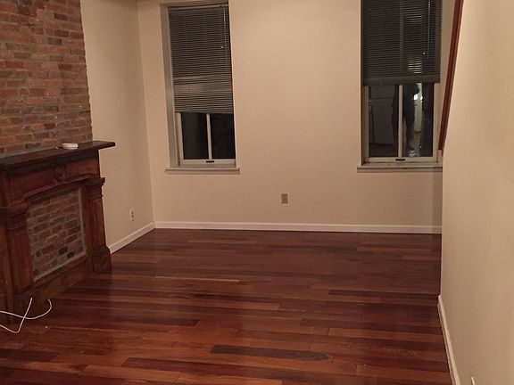 gorgeous hardwoods, exposed brick