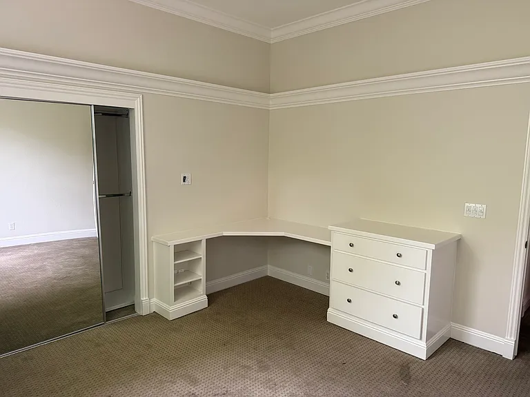 Upper guest bedroom close to laundry room and kitchen with easy full bath access across the hall