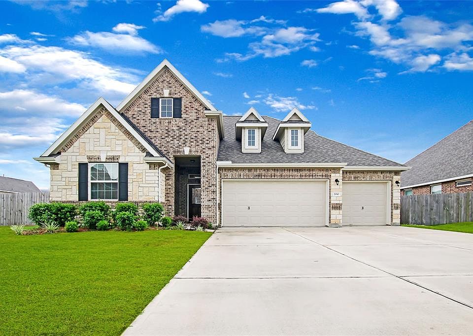 Beautiful Home with 3 car garage, 3 bedrooms on first floor & 1 bedroom 2nd floor.