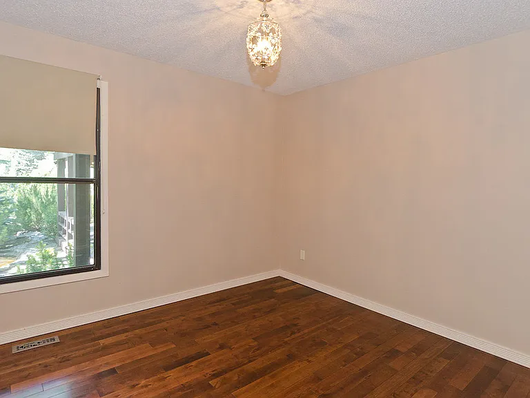 740 Coach Bluff Cres SW — Photo 16