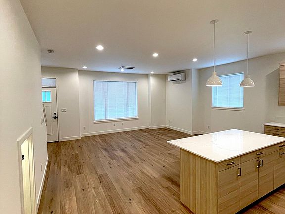 Living Room/Dining Room. Under stair storage (to left). Powder Bath to left (not shown)