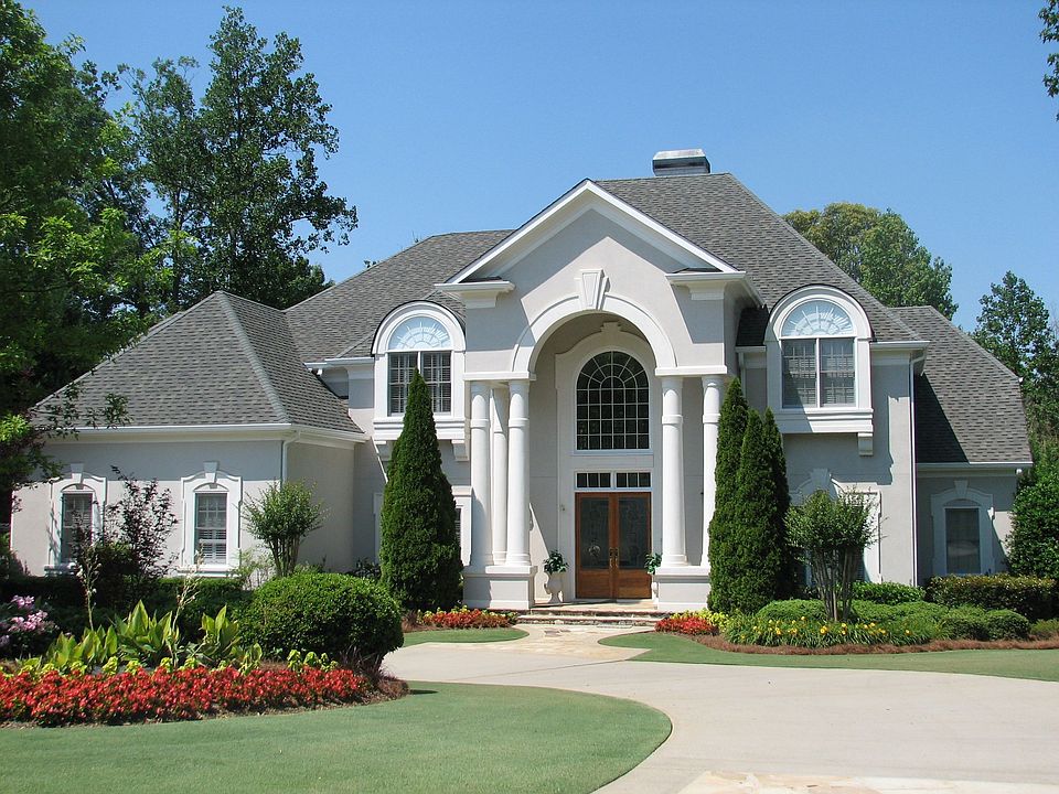 Beautifully maintained stucco home.