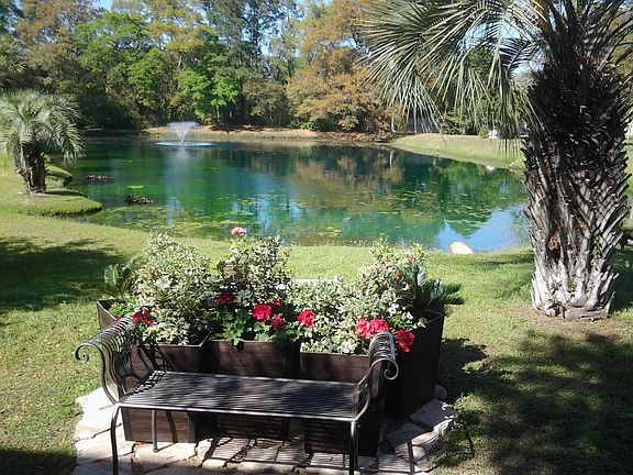 Pondside Garden and Bench for a.m. coffee. Just steps off your private deck.