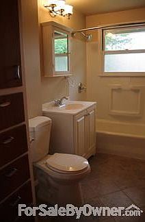 Living Room w/fireplace
						:
						Oak hardwood floors throughout plus wood burning fireplace.