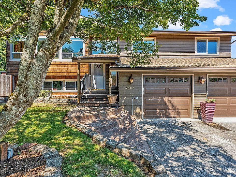 Welcome to 4803 129th St SE, Everett; a lovely split-level home with an abundance of square footage and a park-like setting with backyard privacy. This home is situated in a quiet cul-de-sac with eye catching curb appeal and is located within the Snohomish School District!  Fresh exterior paint and a new 30-year architectural roof really make this home stand out.  The terraced, staired walkway leads to a covered entryway with metal stair railing and Trexx decking.>