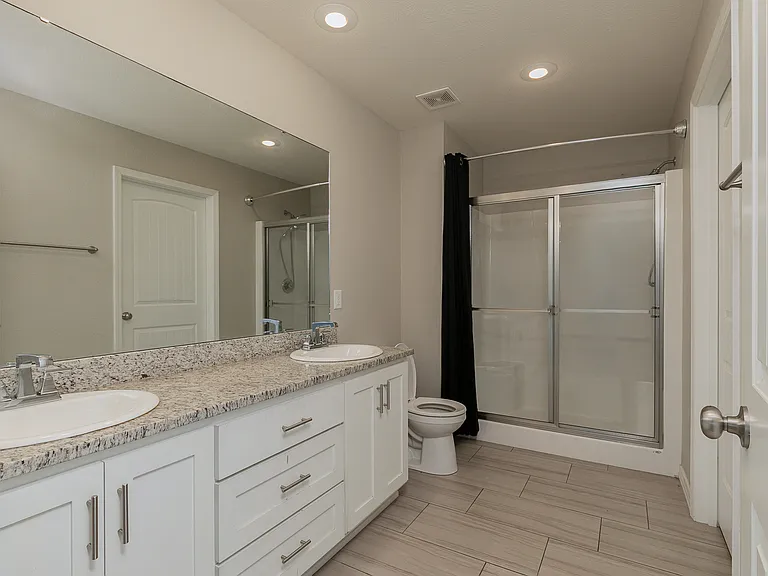 bathroom with double sinks