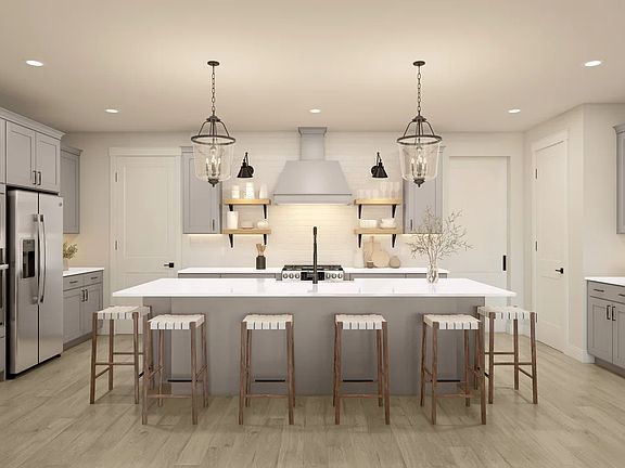 Kitchen with pendant lights over island