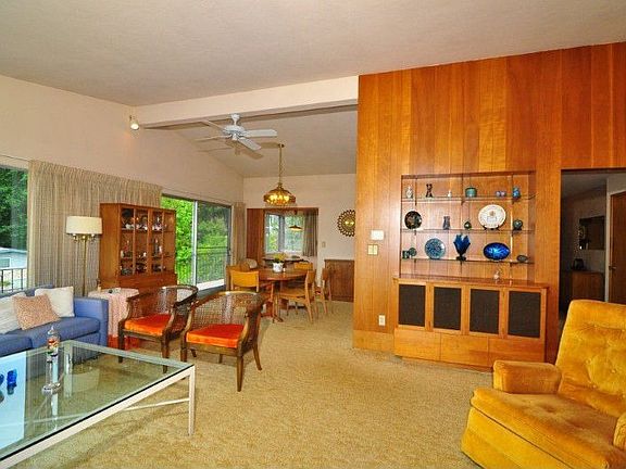 From the living room you can enjoy more of the view and comfort of home in the dining room. Beyond that is the breakfast nook in the kitchen