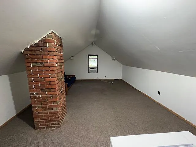 Bonus space (city codes lists it as non-habitable: may not be used for bedroom or primary living) . It is insulated and carpeted. There is no central heating and cooling in the attic. Must provide own heating and cooling.