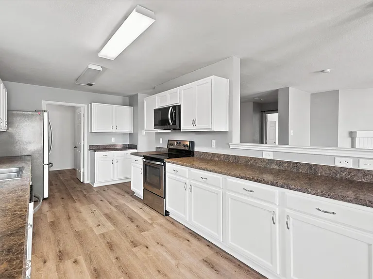 Kitchen with ample cabinets and counter space
